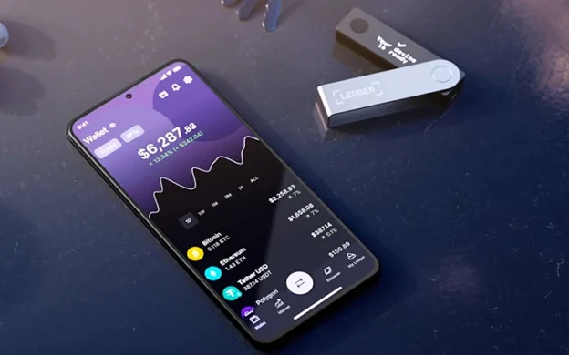 Ledger Nano X beside a mobile wallet interface